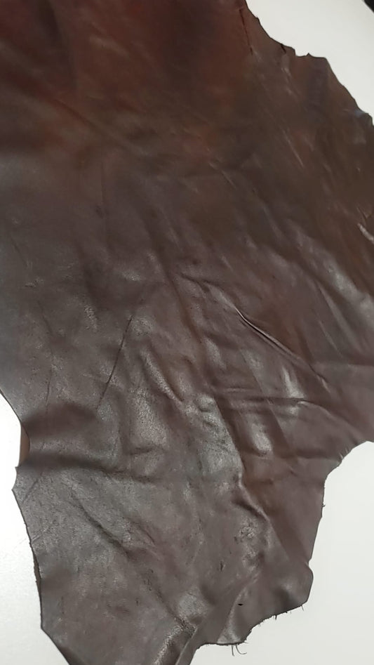 Brown leather hide beautifully contrasted with black details.